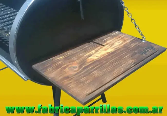 Tabla frontal rebatible para parrillas rodantes